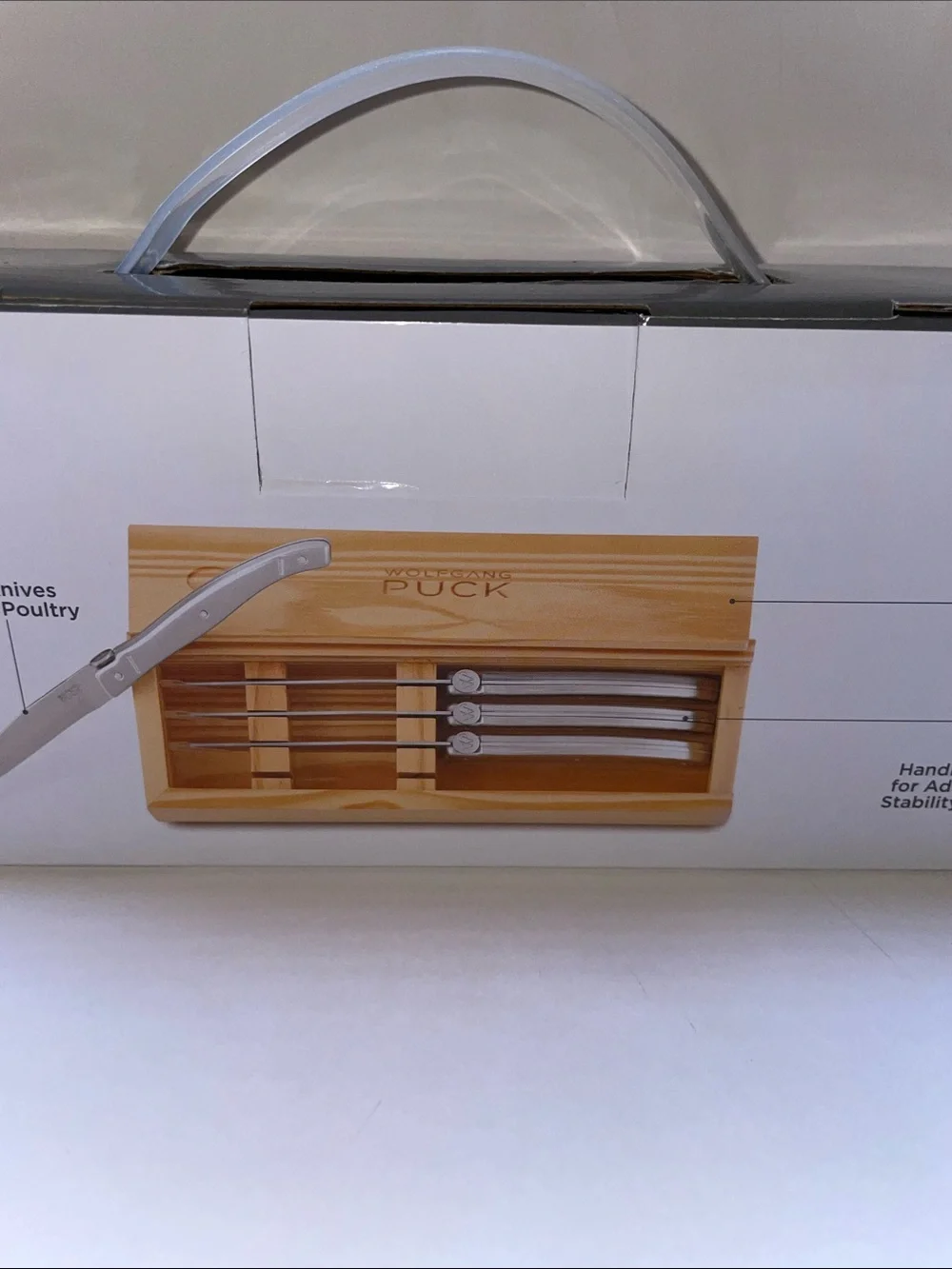 NIB Wolfgang Puck 4-Piece Stainless Steel Steak Knife Set.